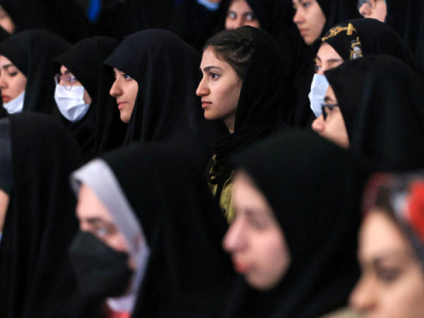 Female students attend a National Student Day ceremony at Tehran University in Iran, Dec. 7, 2022.