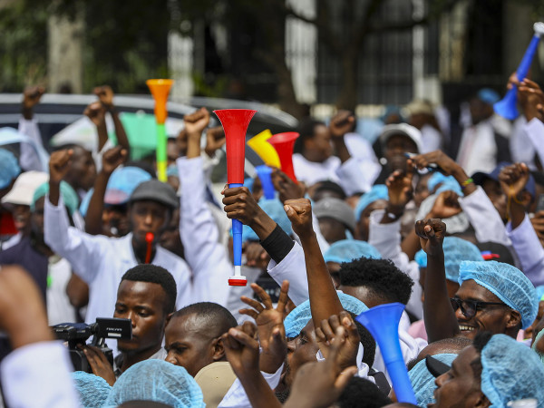 Intern doctors and medical practitioners rally during a protest against the government's failure to hire intern doctors and demanding better working conditions including permanent employment, in Nairobi, Kenya, 09 April 2024
