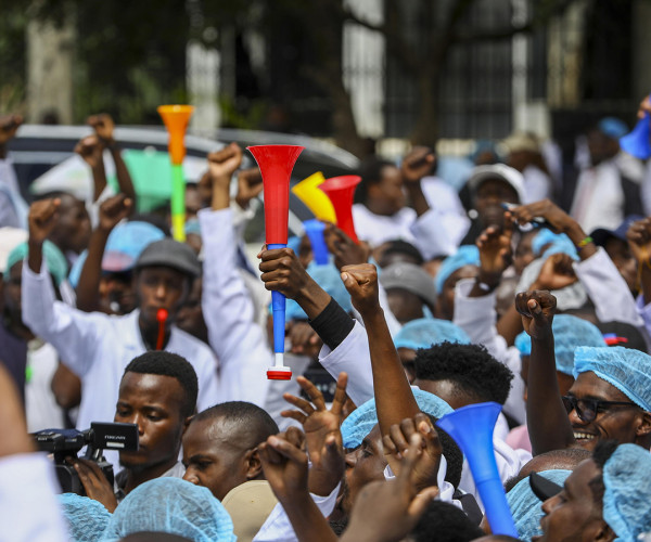 Intern doctors and medical practitioners rally during a protest against the government's failure to hire intern doctors and demanding better working conditions including permanent employment, in Nairobi, Kenya, 09 April 2024