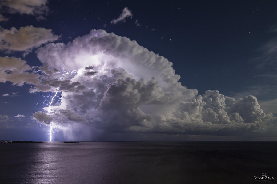 Lightning from an Isolated Storm over Cannes Bay di Serge Zak