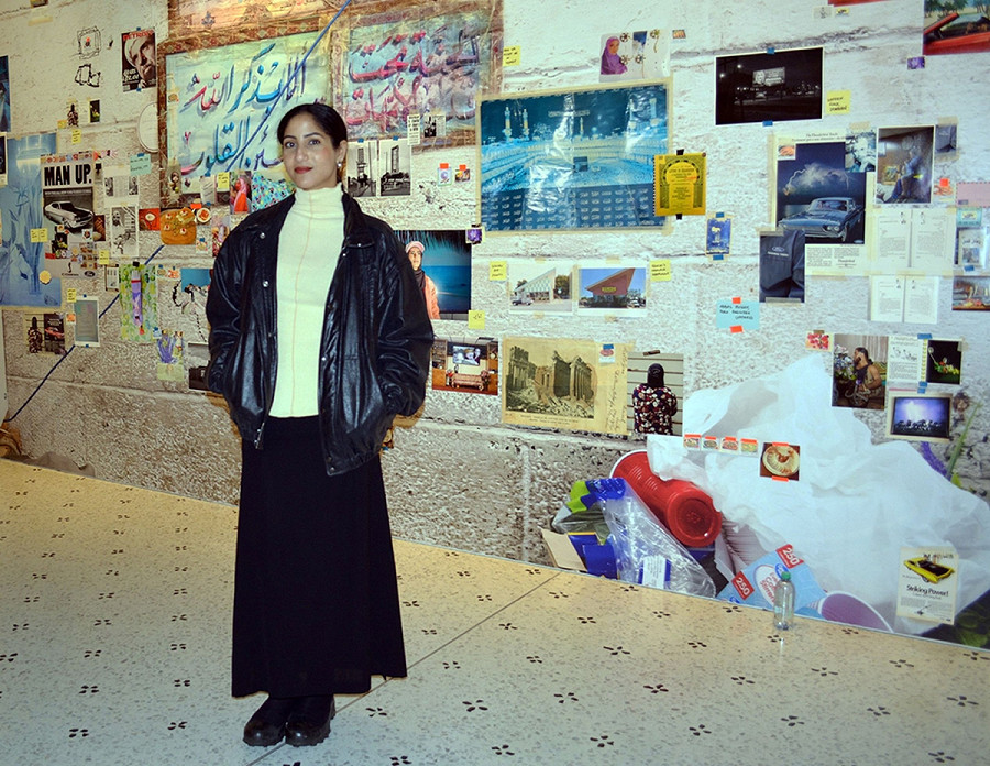 Farah Al Qasimi davanti allo studio wall, MAST, photo Manuela De Leonardis.  