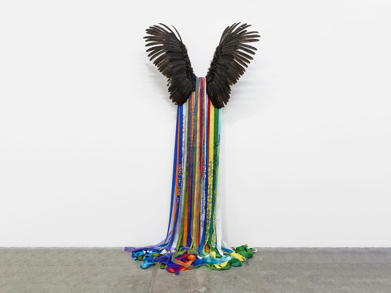 Andrea Bowers, Goddess (Power of the Common Public), 2016, Feathers, metal bracket and ribbons. Courtesy of the artist and Andrew Kreps Gallery, New York